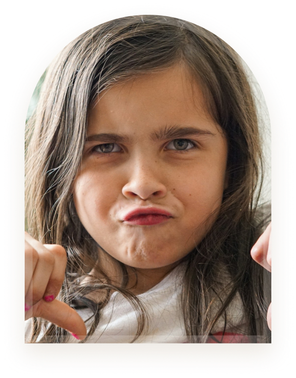 A girl making a frustrated face while pointing